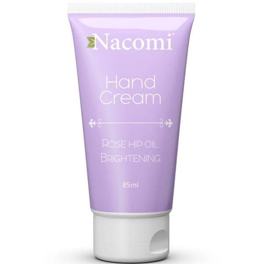 Nacomi aufhellende Handcreme in 85ml, weiße Tube mit Klappdeckel, auf heller Oberfläche liegend, für gepflegte, helle Hände.