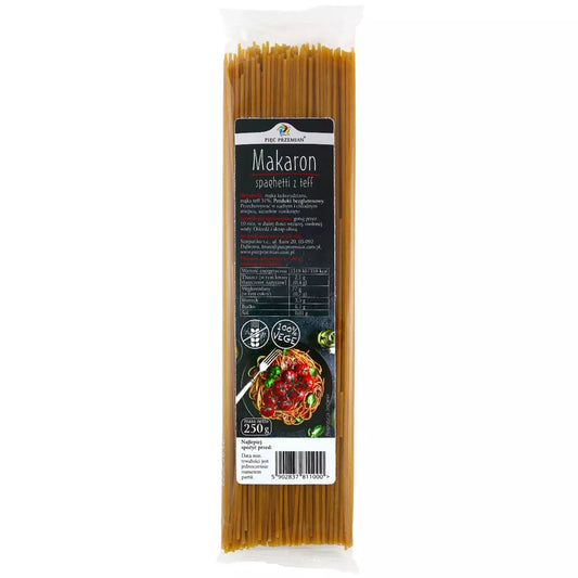 Glutenfreie Teff-Spaghetti von PIĘĆ PRZEMIAN, 250g, in einer Schüssel, ungekocht mit Teff-Flocken und frischen Kräutern sichtbar