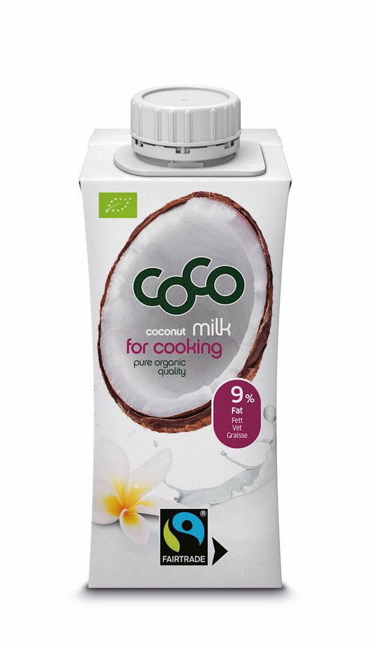Dunkle Dose mit 200 ml Fair Trade Kokosnussmilch von COCO Dr. Martins, cremige Kokosnussmilch in Dose, Nahaufnahme