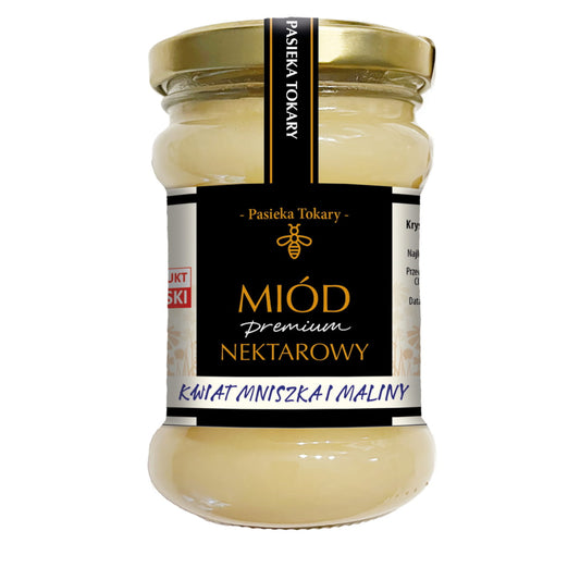 Honig Wiekolkwiahty Premium von MIÓD TOKARY in 400 g Glas, Nahaufnahme der goldgelben Bienenhonigtextur