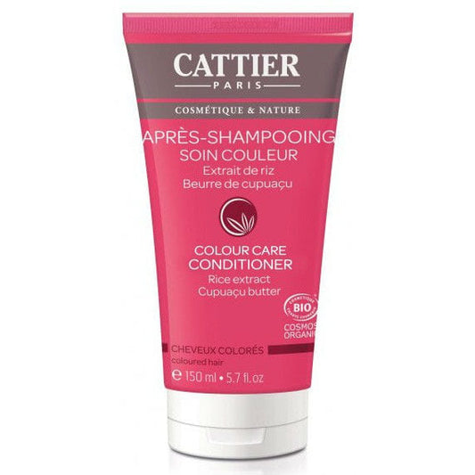 Conditioner für gefärbtes Haar von CATTIER, EKO, 150 ml, cremige Textur, zeigt die Flasche und das Produkt in einer natürlichen Umgebung.