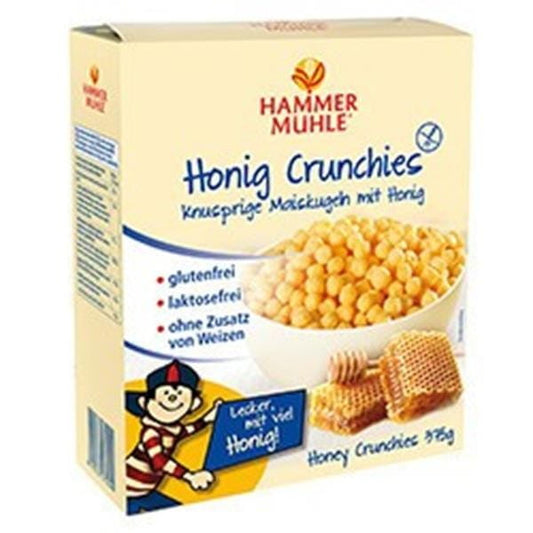 Glutenfreie Maisflocken mit Honig in 375 g Packung von HAMMERMUHLE, Nahaufnahme der knusprigen Cornflakes mit Honig.