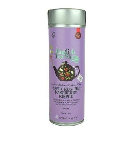 Bio Früchtetee mit Apfel und Rose von ENGLISH TEA SHOP, 30 g, zeigt lose Teeblätter mit getrockneten Früchten und Blüten.