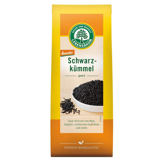 Bio Schwarzkümmel Samen von LEBENSBAUM in 50 g Packung, Nahaufnahme der schwarzen Samen auf weißem Hintergrund