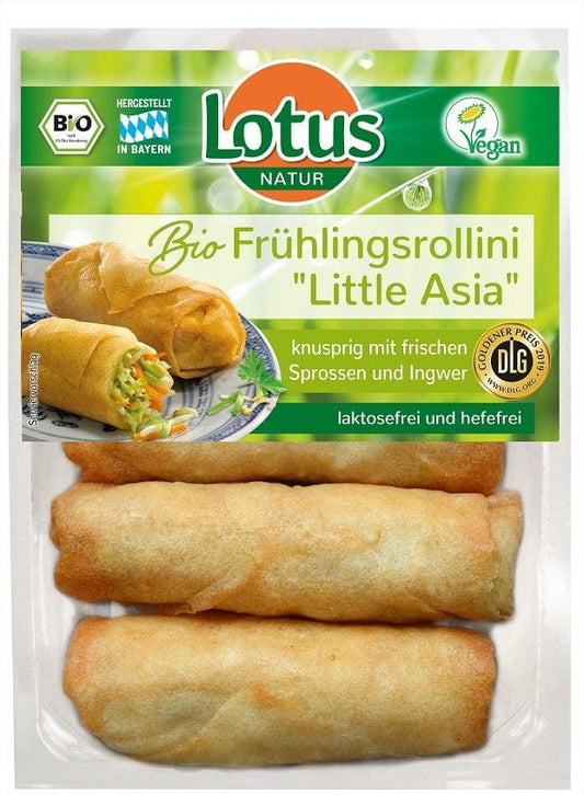 Frühlingsrollen mit Ananas und Gemüse, BIO, von LOTUS, auf einem Teller serviert, detailreiche Ansicht.