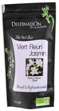 Bio grüner Jasmintee in 100g Verpackung von DESTINATION, mit frischen grünen Blättern und Jasminblüten, für aromatischen Teegenuss