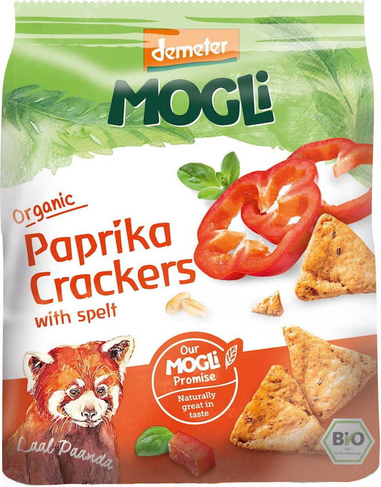 Dinkelcracker mit Paprika, Tomaten und Oregano, BIO, von MOGLI, auf einem weißen Teller liegend, frisch und knusprig
