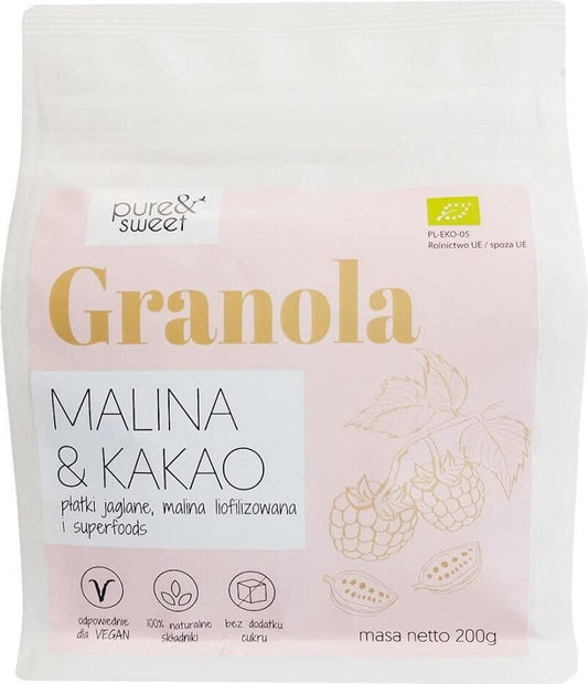 Bio glutenfreie Granola mit Himbeere und Kakao von PURE&SWEET, zeigt die knusprige Schüssel mit Beeren und Kakaostücken.
