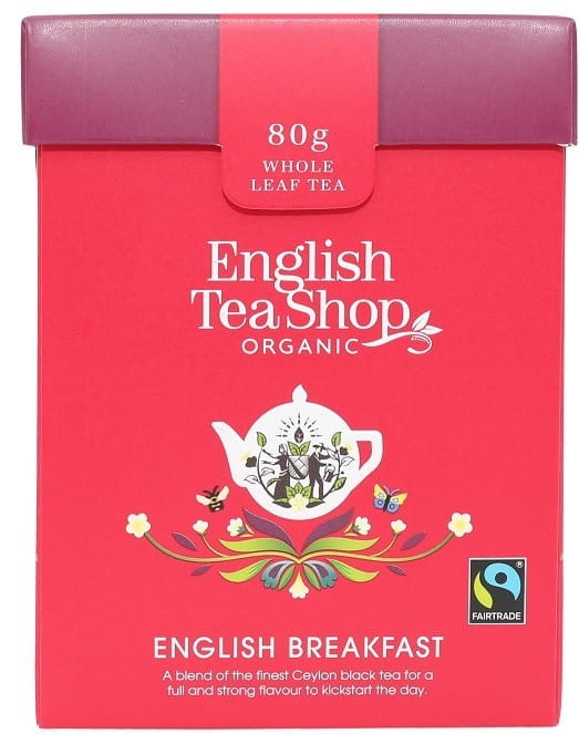 Bio englischer Frühstückstee von ENGLISH TEA SHOP in einer 80g Verpackung, zeigt eine Teetasse und Teeblätter.