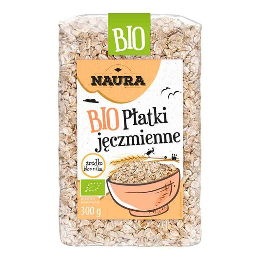 Bio Gerstenflocken von NAURA in 300 g Packung, Nahaufnahme der getrockneten, getreideartigen Flocken.