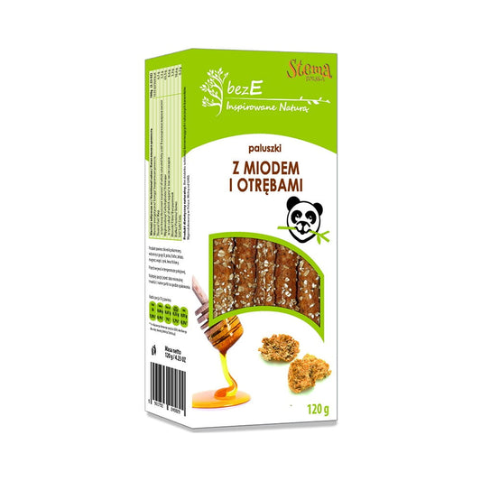 Knusprige Grissini mit Honig und Kleie von STEMA, ohne E-Nummern, auf einem weißen Teller, ideal für Snacks.