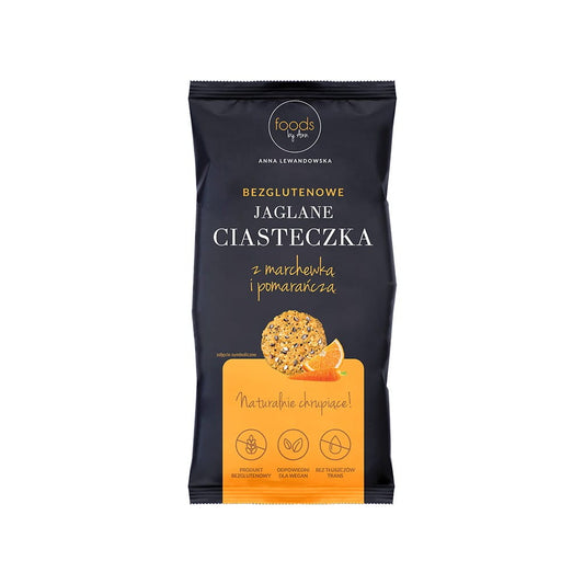 Hirsekekse mit Karotte und Orange von Foods by Ann, 100 g, zeigt frische Kekse mit Karotten- und Orangenscheiben.