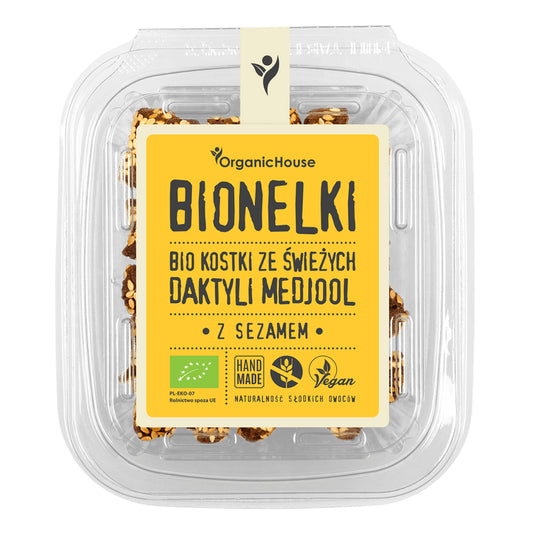 Bio Datteln mit Sesam, glutenfrei, 80 g von BIONELKI, zeigt die gedrehten, sesamüberzogenen Datteln in einer Verpackung.
