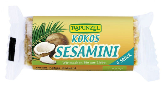 Bio-Kokos-Sesamsamen von RAPUNZEL, 27 g, Nahaufnahme der weißen Sesamsamen in einer transparenten Verpackung.